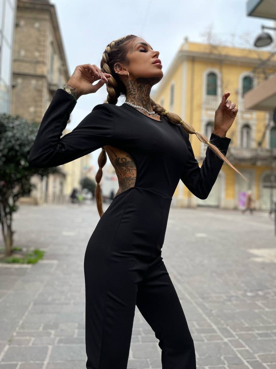 Tuta schiena aperta