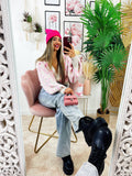 Cardigan maculato rosa con gioiello