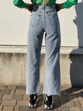 Jeans wide leg con strappi e dettaglio
