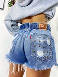 Short Levi’s Vintage con Borchie e strappi