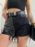 Jeans nero con borchie