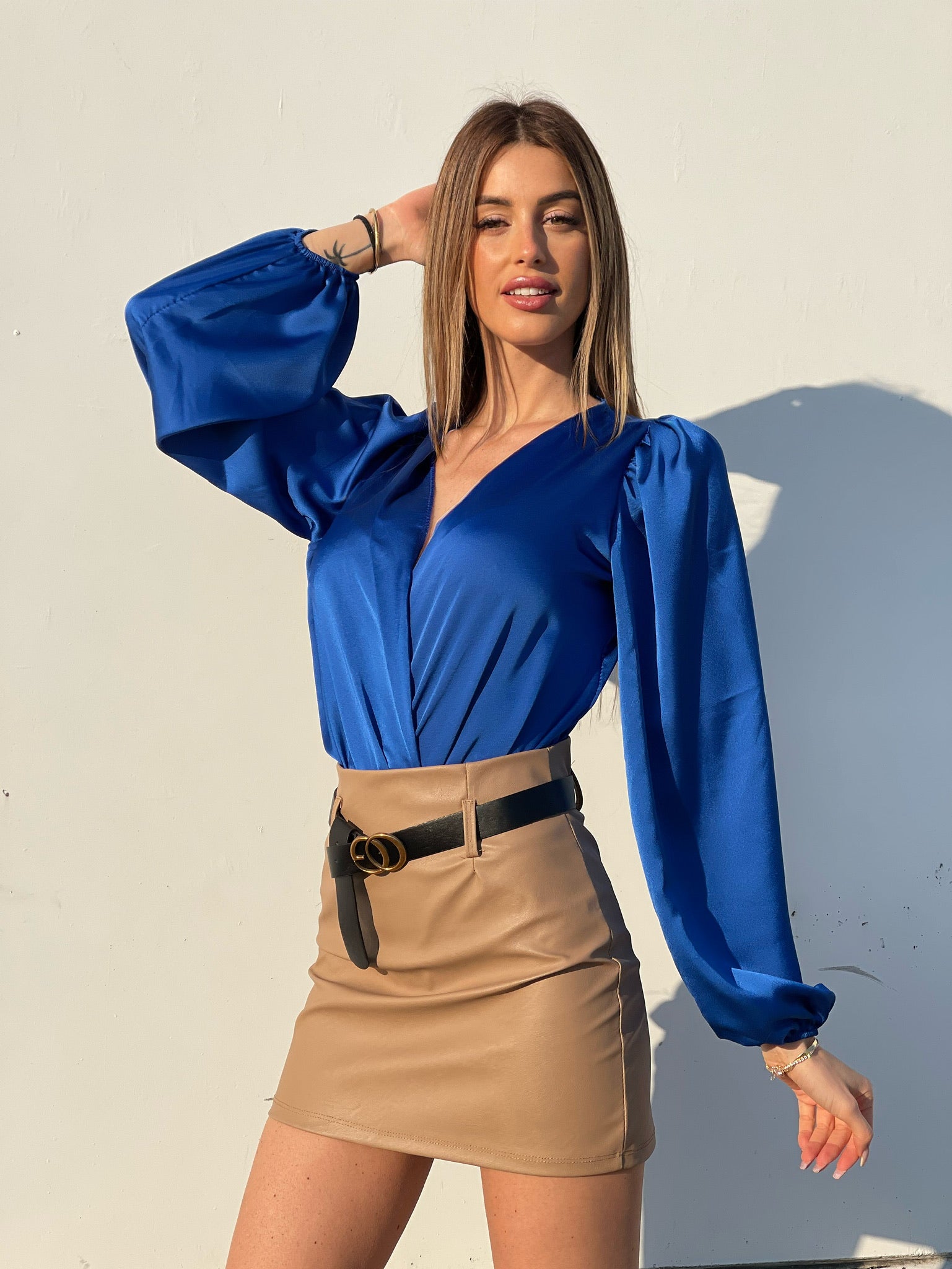 Gonna in ecopelle con cintura nude