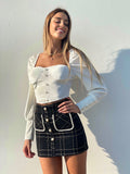 Gonna in tweed bianca e nera
