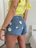 Short con margherite