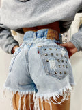 Short Levi’s Vintage bagno chiaro con borchie
