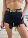Short nero con strappini