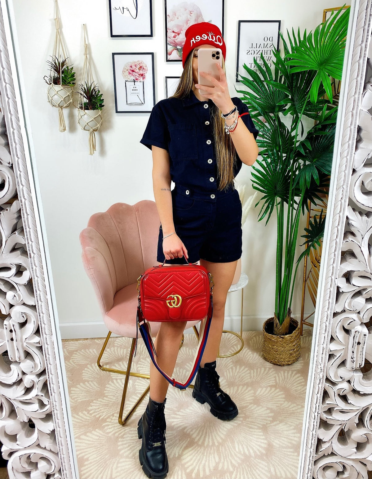 Tutina in jeans nera con tasche