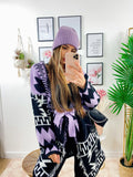 Cardigan lilla con frange e cinta