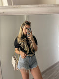 Camicia nera con ricami oro