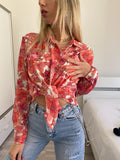 Camicia floreale corallo