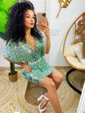 Abito con paillettes manica corta