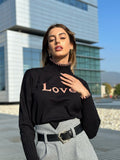 Pull nero e rosa