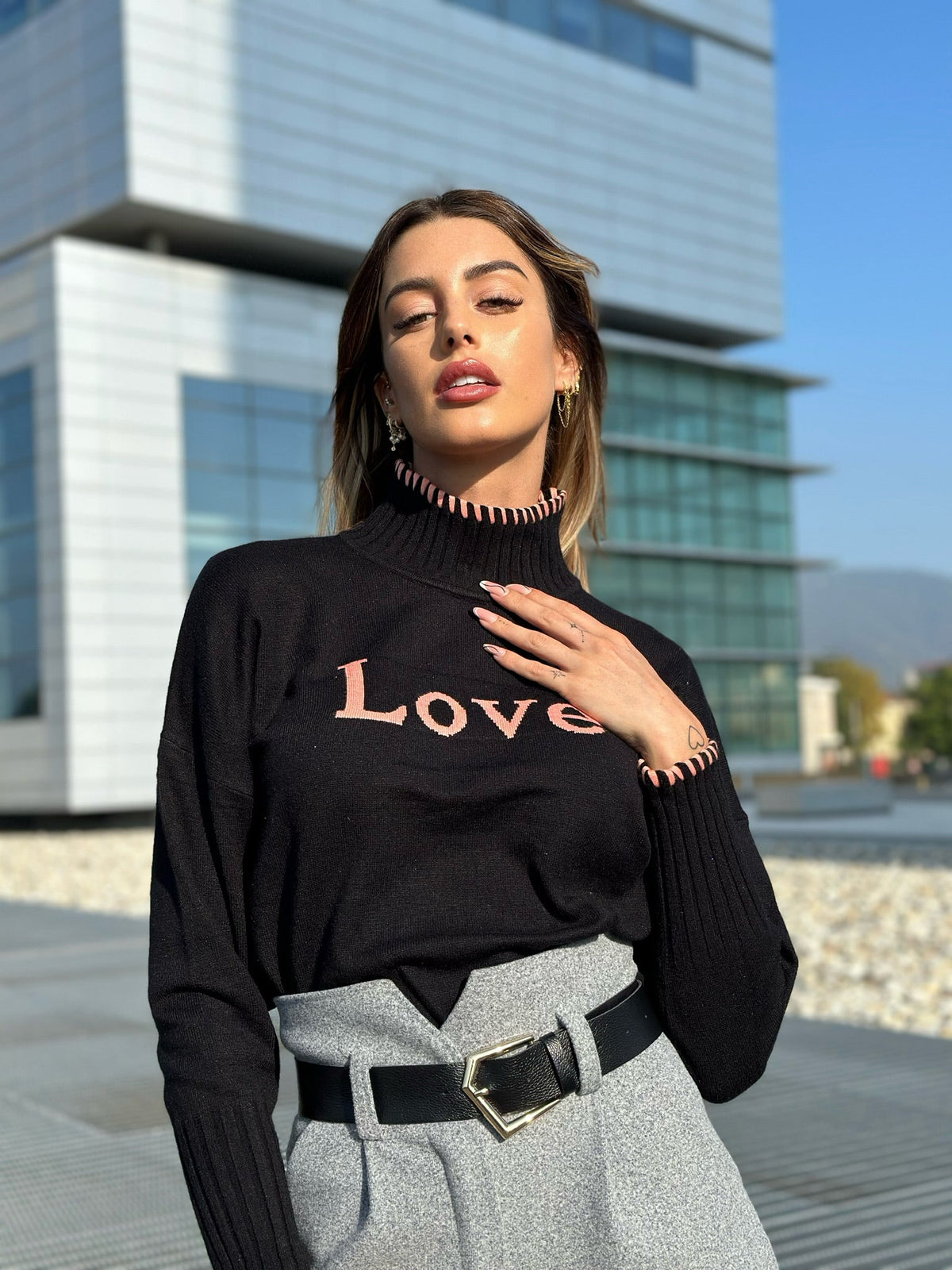 Pull nero e rosa
