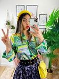 Camicia fiorata base verde