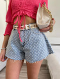 Short jeans a farfalla con strappini