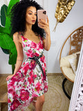 Abito con gonna asimmetrica e fiorellini Fuxia base bianco