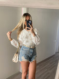 Short in jeans con frange