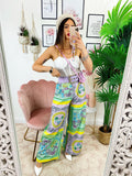 Pantalone a zampa stampa etnica Base verde