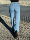 Jeans con strass e cuore