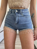 Short in jeans con frange in strass