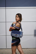 Abito multicolor con scollo base nera