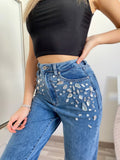 Jeans con pietre in strass