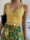 Top in pizzo giallo con pizzo
