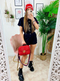 Tutina in jeans nera con tasche