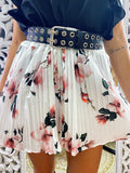 Short a pieghine con fiori rosa