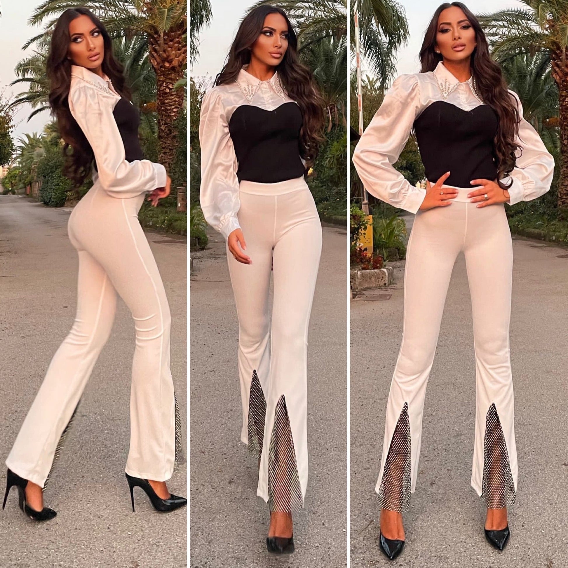 Pantaloni a zampa con strass bianco