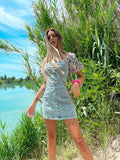 Abito in jeans con maniche a fiori