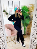 Completo maglia e pantalone largo nero