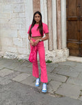 Completo maglia crop e pantalone Fuxia