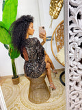 Abito con paillettes bronzo schiena aperta