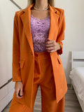 Completo oversize giacca e pantalone arancio