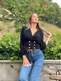 Blusa nera bottoncini oro