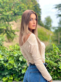 Top beige morbido con scollo