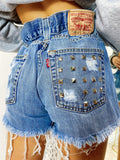 Short Levi’s Vintage con Borchie