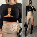 Top nero con gioiello