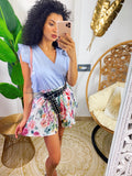 Short a pieghine con fiori sfumati lilla
