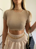 Top crop nude manica corta