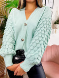 Maglione con onde e bottoni gioiello Verdeacqua