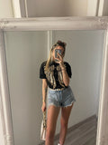 Camicia nera con ricami oro