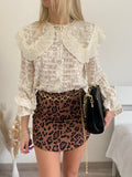 Camicia in pizzo beige con ricami