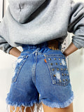 Short Levi’s Vintage bagno scuro con borchie