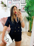 Completo nero con bottoni oro