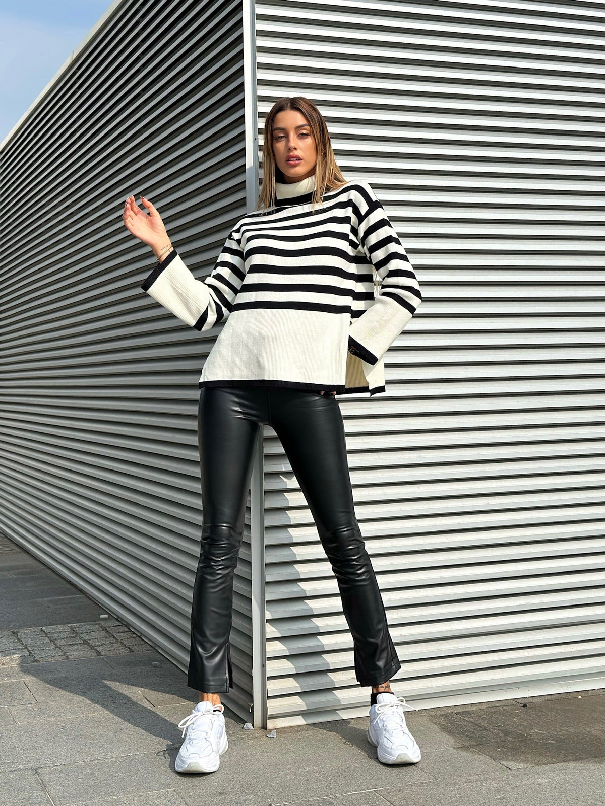 Maglione a righe collo alto