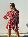 Abito con gonna a ruota rosso e rosa