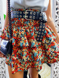 Gonna a balze con fiori rossi e verdeacqua