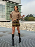 Maglione beige con trecce
